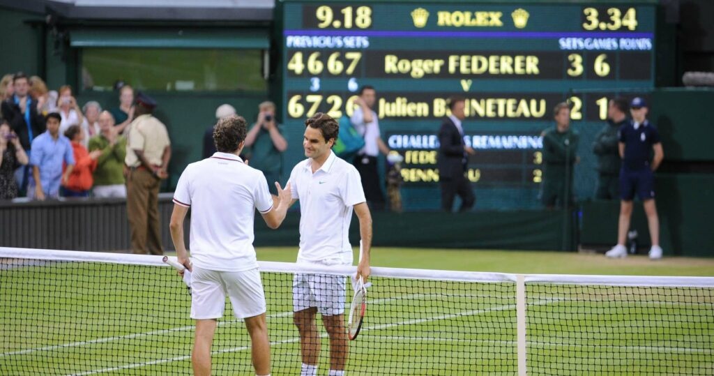 Roger Federer & Julien Benneteau at Wimbledon in 2012