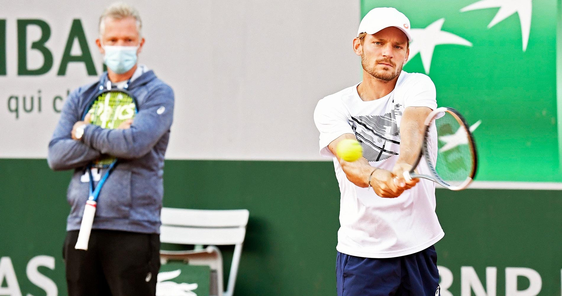 David Goffin with Thomas Johansson looking on
