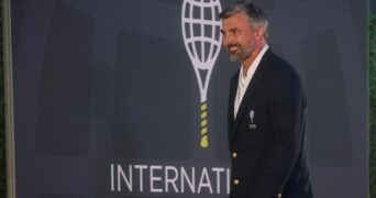 Former tennis player Goran Ivanisevic of Croatia smiles after being inducted into the International Tennis Hall of Fame