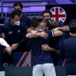 Britain's Joe Salisbury and Neal Skupski celebrate with teammates after winning their doubles match against Czech Republic's Tomas Machac and Jiri Vesely