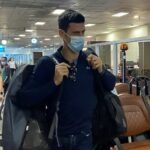 Novak Djokovic walks at Dubai Airport in Dubai, United Arab Emirates, January 17, 2022.