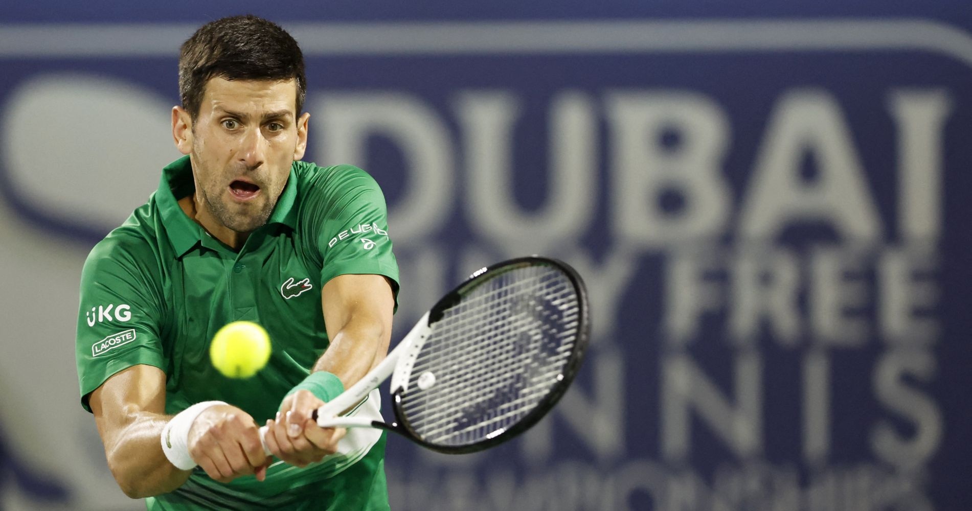 Serbia's Novak Djokovic in action during his first round match against Italy's Lorenzo Musetti at the Dubai Tennis Championships
