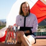Iga Swiatek of Poland during the champions trophy shoot after winning the final of the 2022 BNP Paribas Open WTA 1000 tennis tournament