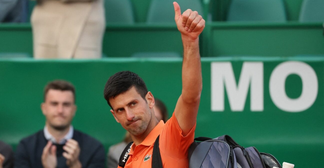 Novak Djokovic acknowledges spectators as he walks off the court after losing his second round match against Spain's Alejandro Davidovich Fokina at the Rolex Monte-Carlo Masters 2022