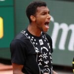 Canada's Felix Auger-Aliassime celebrates during his first round match against Peru's Juan Pablo Varillas at the French Open