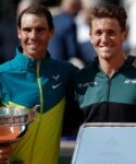 Spain's Rafael Nadal and Norway's Casper Ruud pose with trophies after the men's singles final at Roland Garros 2022
