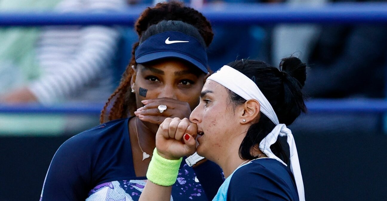 Serena Williams of the U.S. and Tunisia's Ons Jabeur after winning their double quarter final match at the Eastbourne International