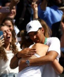 Elena Rybakina in her coach Stefano Vukov's arms, Wimbledon 2022