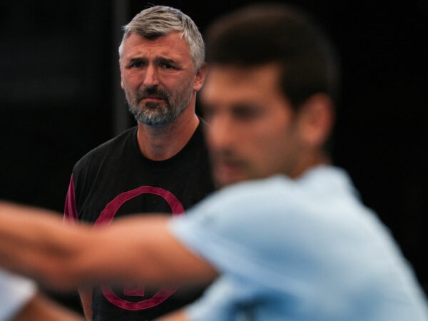 Serbia's Novak Djokovic practices as coach Goran Ivanisevic looks in Adelaide on December 30, 2022.