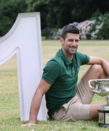 Novak Djokovic with the 2023 Australian Open trophy