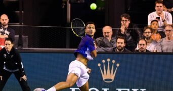 Arthur Fils hits a forehand during his match against Fabio Fognini at the quallies of Rolex Paris Masters 2022