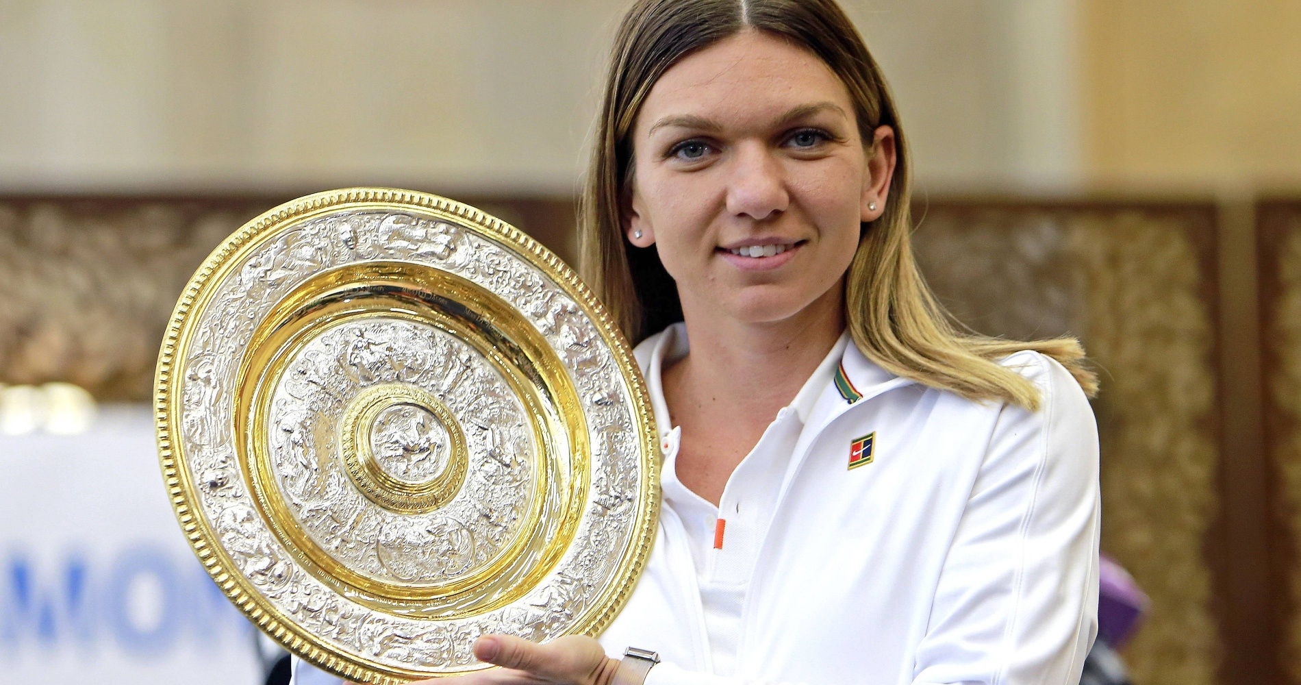 Simona Halep with her 2019 Wimbledon trophy in Bucharest