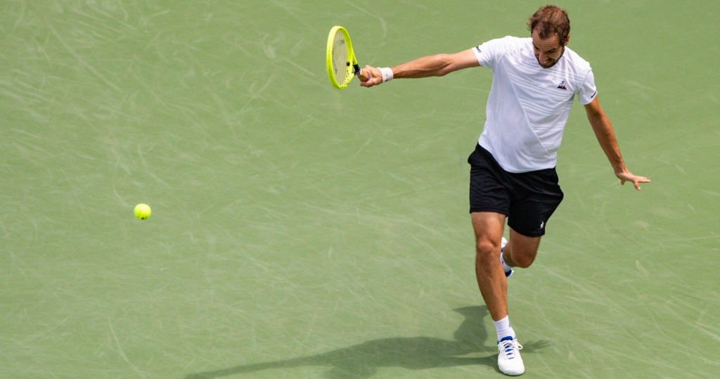 Richard Gasquet hitting a backhand in Cincinnati in 2019 