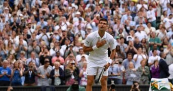 Novak Djokovic celebrates winning his semi final match against Canada's Denis Shapovalov