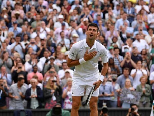 Novak Djokovic celebrates winning his semi final match against Canada's Denis Shapovalov