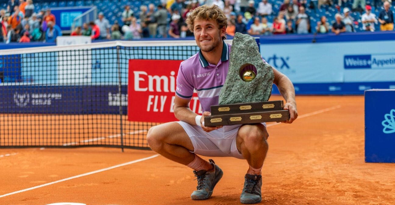 Casper Ruud of Norway receives during the award ceremony, the trophy at the Gstaad Swiss Open ATP Tour 250 Series 2021 tournament