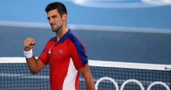 Men's Singles - Quarterfinal - Ariake Tennis Park - Tokyo, Japan - July 29, 2021 Novak Djokovic of Serbia celebrates after winning his quarterfinal match against Kei Nishikori of Japan