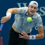 John Isner (USA) serves the ball against Cameron Norrie (GBR) during the Western and Southern Open tennis tournament at Lindner Family Tennis Center