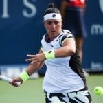 MONTREAL, QC - AUGUST 09: Ons Jabeur (TUN) returns the ball during the first round WTA National Bank Open match on August 9, 2021 at IGA Stadium in Montreal, QC