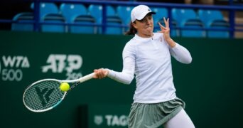 Iga Swiatek of Poland in action during the first round at the 2021 Viking International WTA 500 tennis tournament in Eastbourne