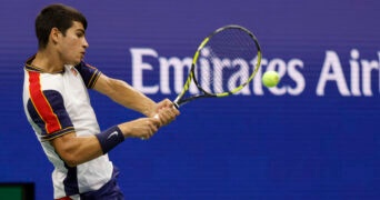 Carlos Alcaraz of Spain hits a backhand on day nine of the 2021 U.S. Open tennis tournament at USTA Billie Jean King National Tennis Center.