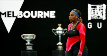 Serena Williams of the U.S. reacts after winning the first set during her quarter-final match against Romania's Simona Halep