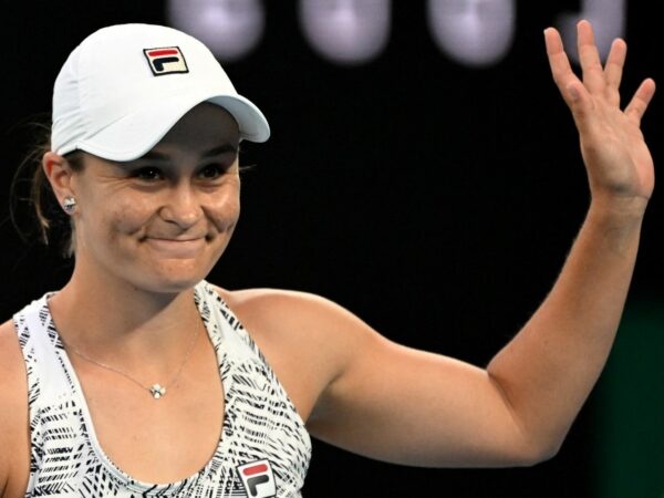Australia's Ash Barty waves at fans at the 2022 Australian Open