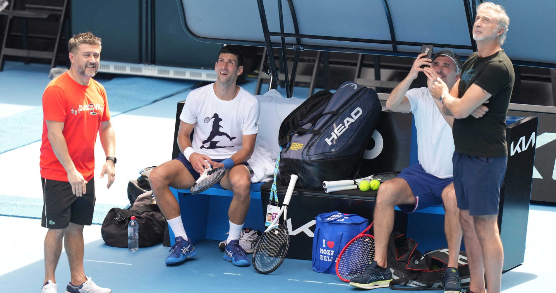 Novak Djokovic and his staff on Rod Laver Arena, 2022