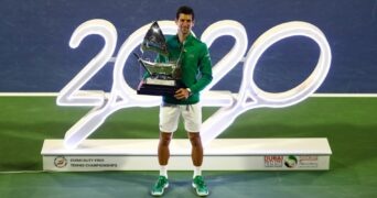 Serbia's Novak Djokovic poses with the trophy after winning the Final against Greece's Stefanos Tsitsipas at the Dubai Duty Free Tennis Championships