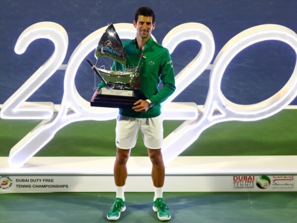 Serbia's Novak Djokovic poses with the trophy after winning the Final against Greece's Stefanos Tsitsipas at the Dubai Duty Free Tennis Championships