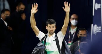 Serbia's Novak Djokovic waves to the crowd after he loses his quarter final match against Czech Republic's Jiri Vesely at the Dubai Tennis Championships