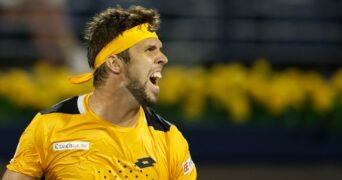 Czech Republic's Jiri Vesely celebrates winning his quarter final match against Serbia's Novak Djokovic at the Dubai Tennis Championships