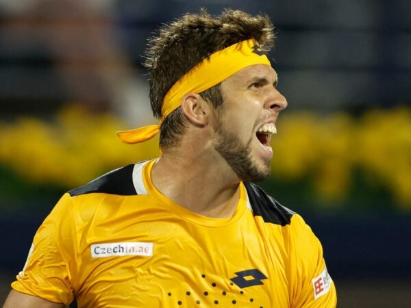 Czech Republic's Jiri Vesely celebrates winning his quarter final match against Serbia's Novak Djokovic at the Dubai Tennis Championships