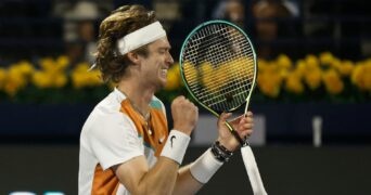 Russia's Andrey Rublev celebrates winning the final match against Czech Republic's Jiri Vesely at the Dubai Tennis Championships