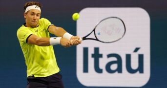 Casper Ruud (NOR) hits a backhand during his men's singles quarterfinal match in the Miami Open at Hard Rock Stadium.