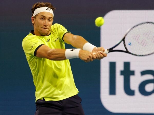 Casper Ruud (NOR) hits a backhand during his men's singles quarterfinal match in the Miami Open at Hard Rock Stadium.