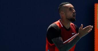 Nick Kyrgios argues with chair umpire Carlos Bernardes after being assessed a point penalty during his fourth round match in the Miami Open at Hard Rock Stadium.