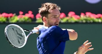 Daniil Medvedev hits a shot in his 2nd round match at the BNP Paribas open at the Indian Wells Tennis Garden.