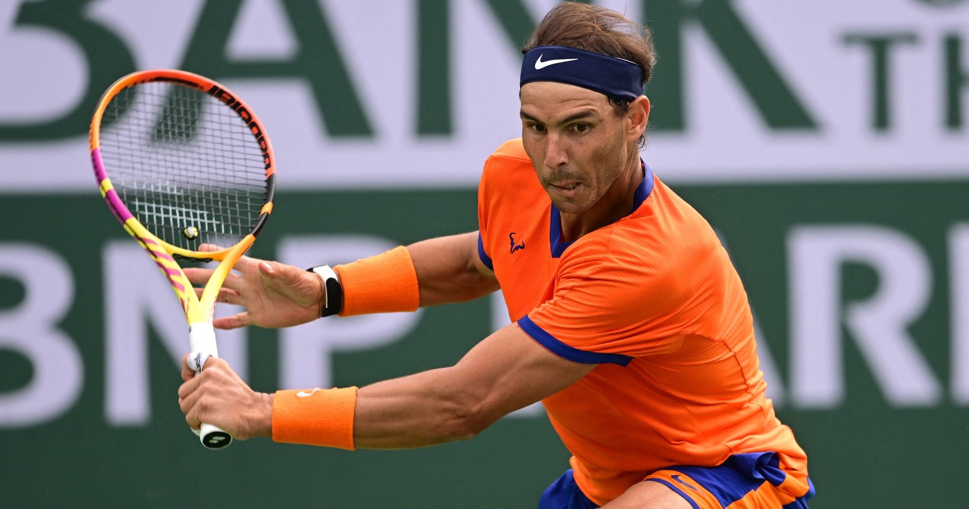 Rafael Nadal (ESP) hits a shot during his semifinal match in the BNP Paribas Open at the Indian Wells Tennis Garden.