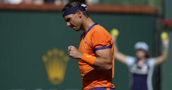 Rafael Nadal, of Spain, reacts after a shot to Sebastian Korda at the BNP Paribas Open tennis tournament Saturday, March 12, 2022, in Indian Wells,