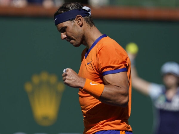 Rafael Nadal, of Spain, reacts after a shot to Sebastian Korda at the BNP Paribas Open tennis tournament Saturday, March 12, 2022, in Indian Wells,
