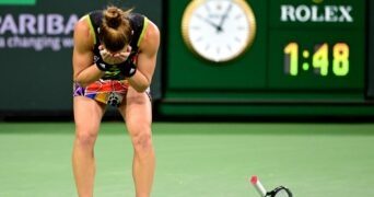 Maria Sakkari (GRE) is overcome with emotion after defeating Paula Badosa (ESP) in her semifinal match during the BNP Paribas Open at the Indian Wells Tennis Garden.