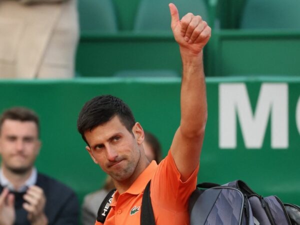 Novak Djokovic acknowledges spectators as he walks off the court after losing his second round match against Spain's Alejandro Davidovich Fokina at the Rolex Monte-Carlo Masters 2022