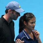 Britain's Emma Raducanu with coach Torben Beltz during a practice at the 2022 Australian Open