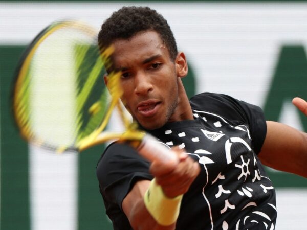 Canada's Felix Auger-Aliassime in action during his first round match against Peru's Juan Pablo Varillas