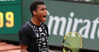 Canada's Felix Auger-Aliassime celebrates during his first round match against Peru's Juan Pablo Varillas at the French Open