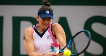 Irina-Camelia Begu of Romania in action at the 2022 Roland Garros Grand Slam tennis tournament