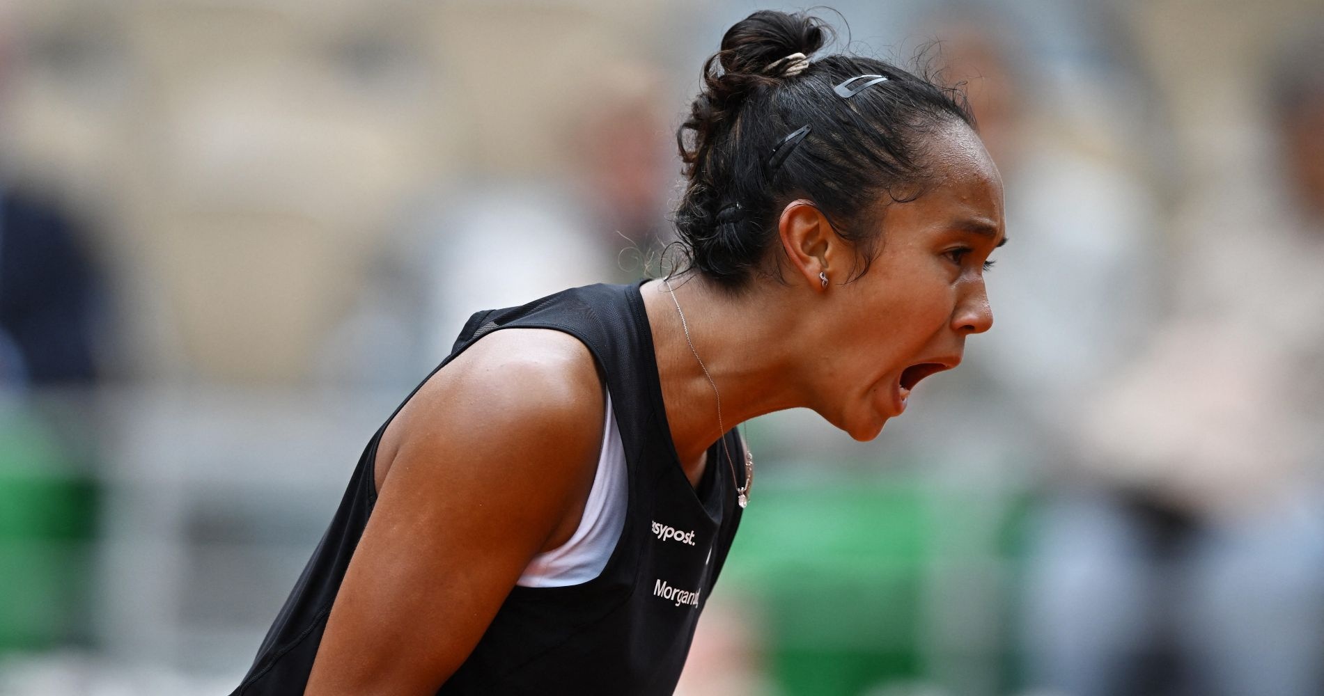 Canada's Leylah Annie Fernandez reacts during her fourth round match against Amanda Anisimova of the U.S. at the French Open