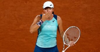 Poland's Iga Swiatek celebrates winning her first round match against Ukraine's Lesia Tsurenko