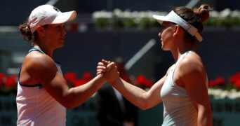 Romania's Simona Halep and Australia's Ashleigh Barty shake hands after their quarter final match at the Madrid Open 2019